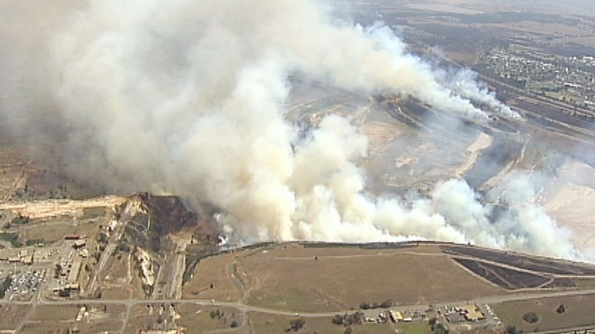 Aerial of fire burning in Hazelwood open cut mine at Morwell