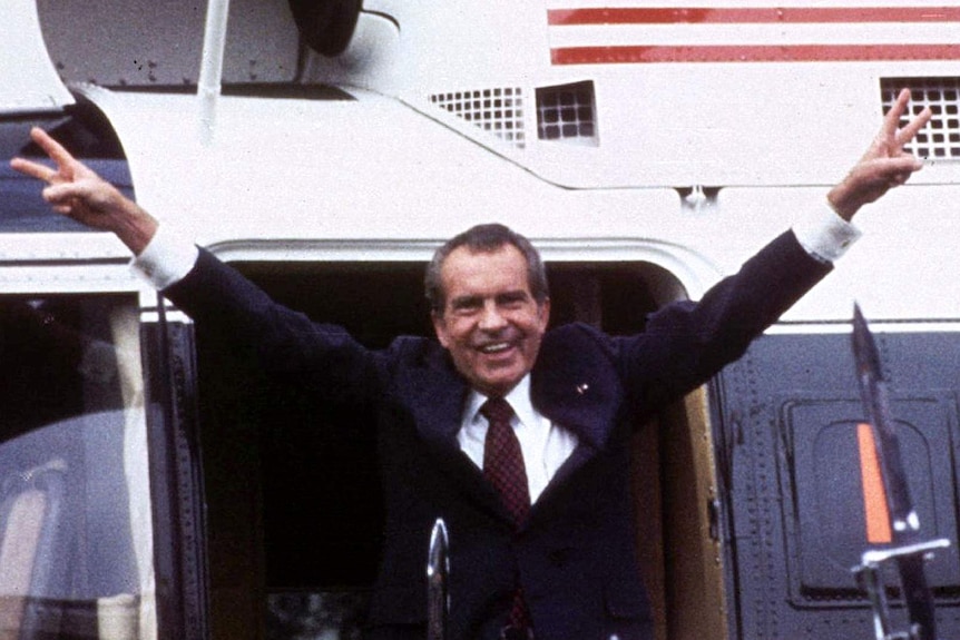 U.S. President Richard M. Nixon flashes the V-for-victory sign.