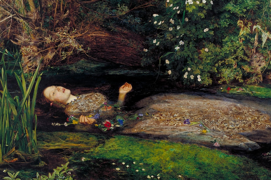 Painting of woman with pale skin and auburn hair lying in water surrounded by flowers, apparently dead.