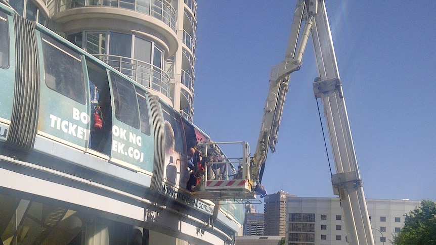NSW Fire Brigades crew rescues passengers from the stranded Sydney Monorail on September 24, 2012.