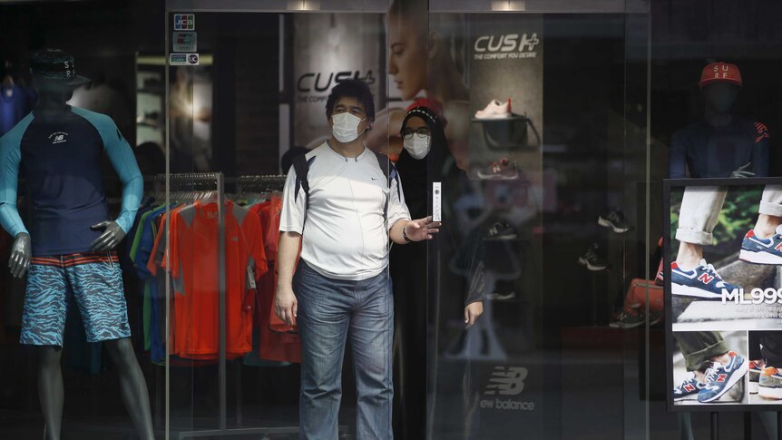 Tourists wearing masks to prevent contracting MERS