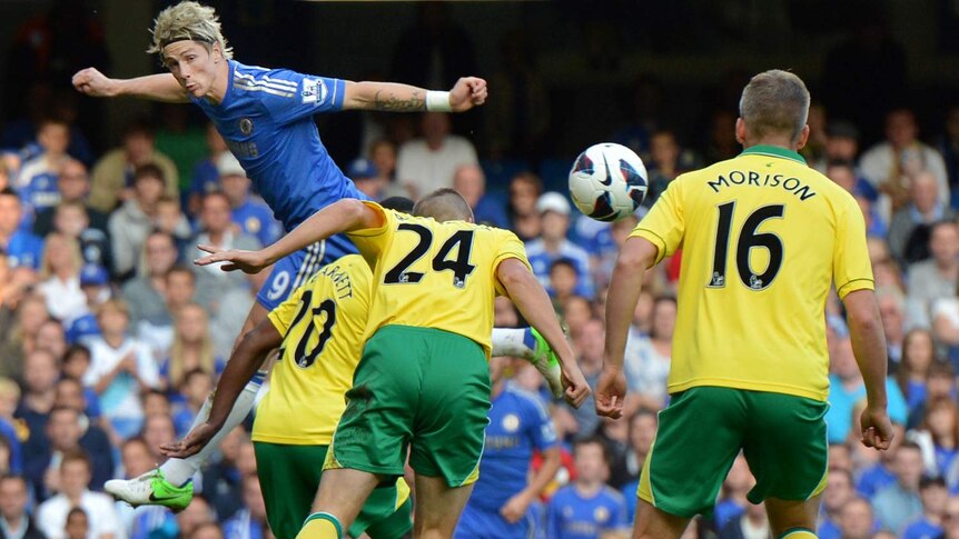 Above the rest: A goal from Fernando Torres helped Chelsea stay atop the Premier League.