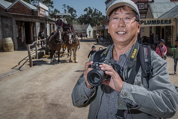 Chinese tourist Zhang Huili in the main street of Sovereign Hill