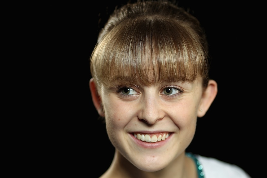 Golden girl: Lauren Mitchell is set to star on the floor at the gymnastics.