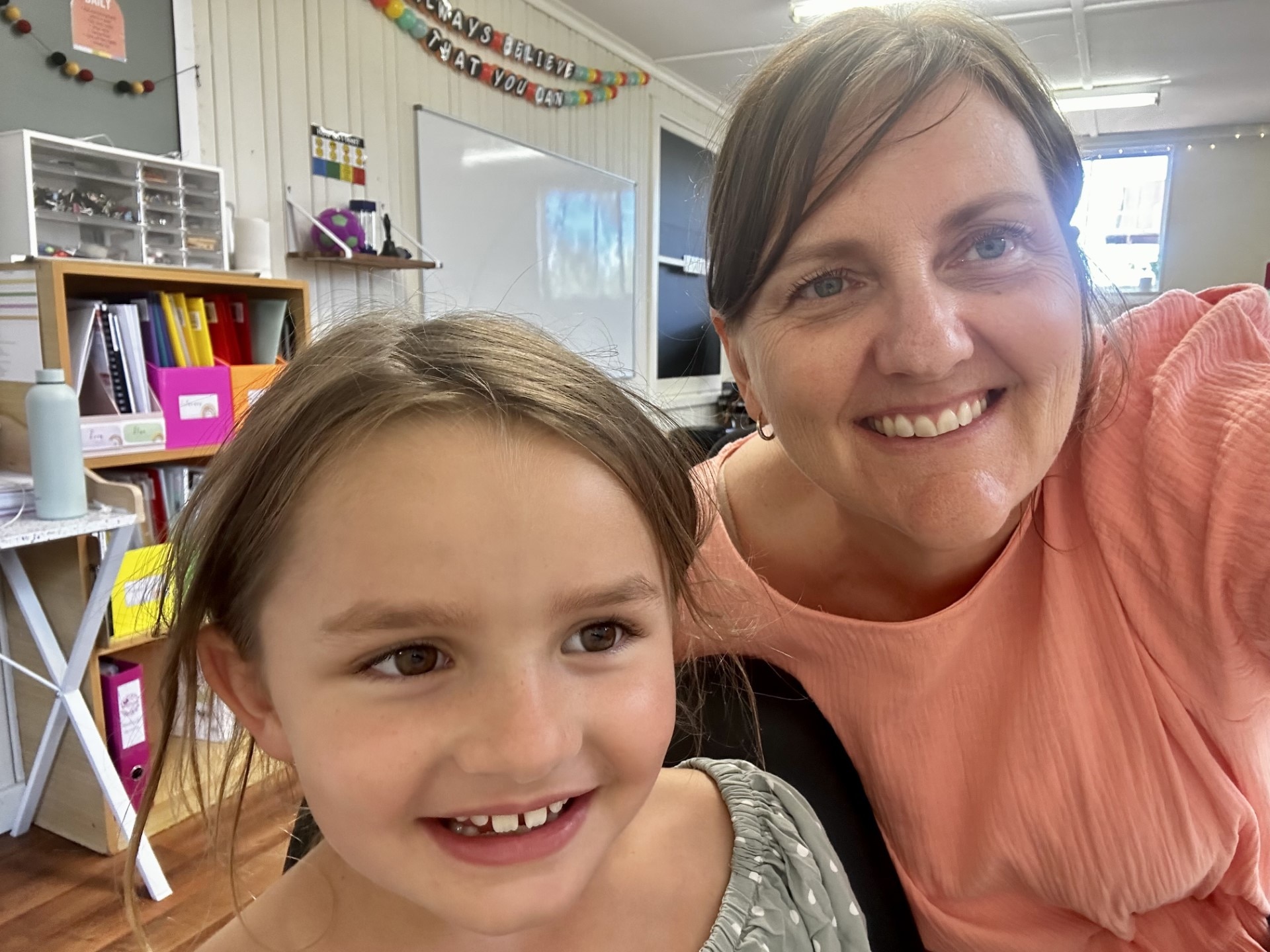 a young girl and an older women in a close up shot 