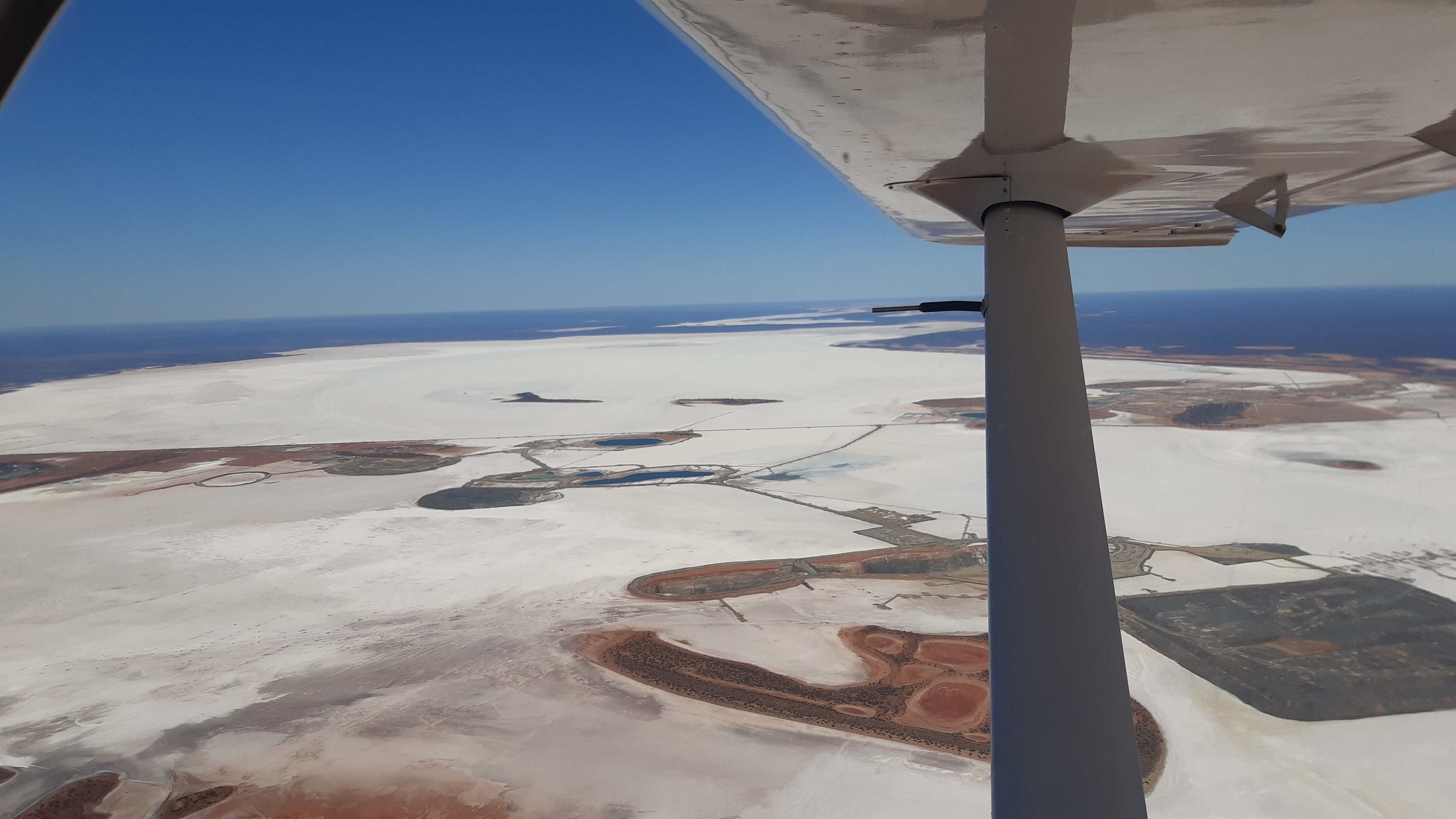 An aerial shot from a recreational plane shows salt lakes in WA.