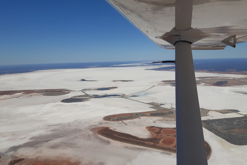 An aerial shot from a recreational plane shows salt lakes in WA.