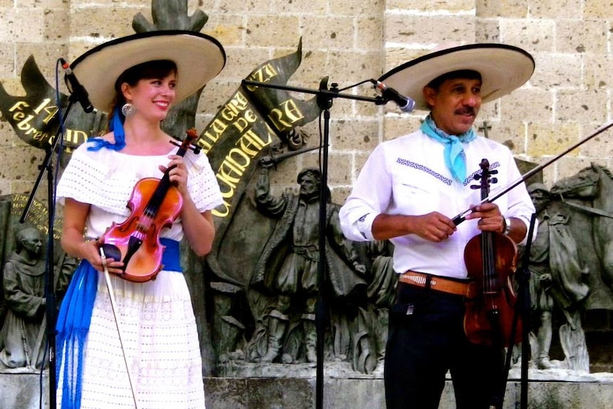 Hayley Armstrong pictured in traditional mariachi dress with her partner Pancho Gomez