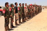Libyan soldiers at militiaman funeral