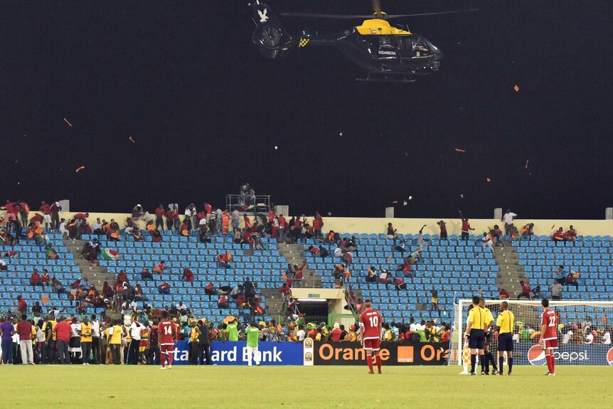 Helicopter flies over as violence disrupts African Nations Cup semi
