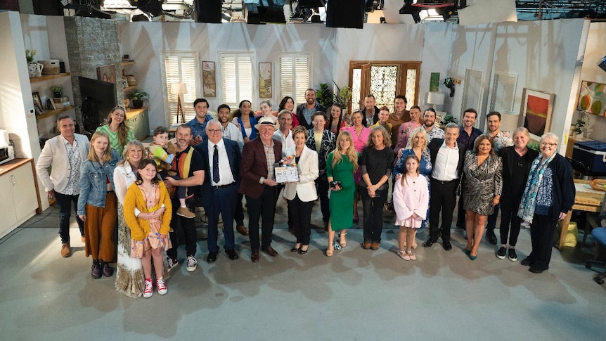  The cast of Neighbours poses for its final day of filming.