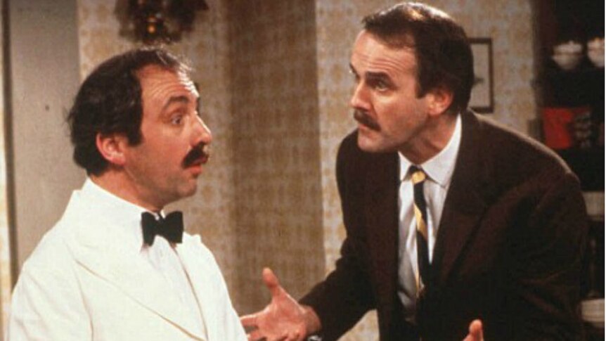 Andrew Sachs opposite John Cleese in the hit comedy Fawlty Towers.