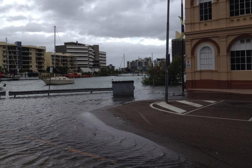 A king tide has inundated Wickham Street, Townsville