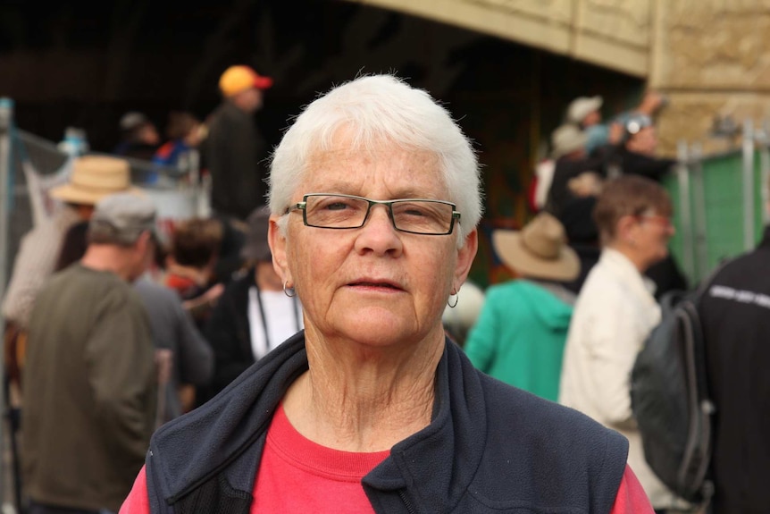 A woman poses for the camera.