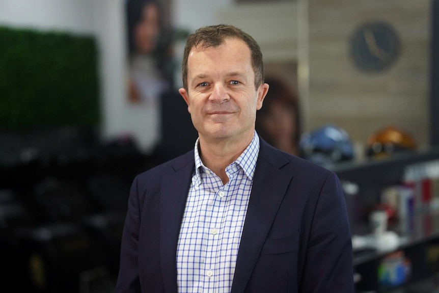 NSW Attorney General, Mark Speakman standing in salon in Nowra.