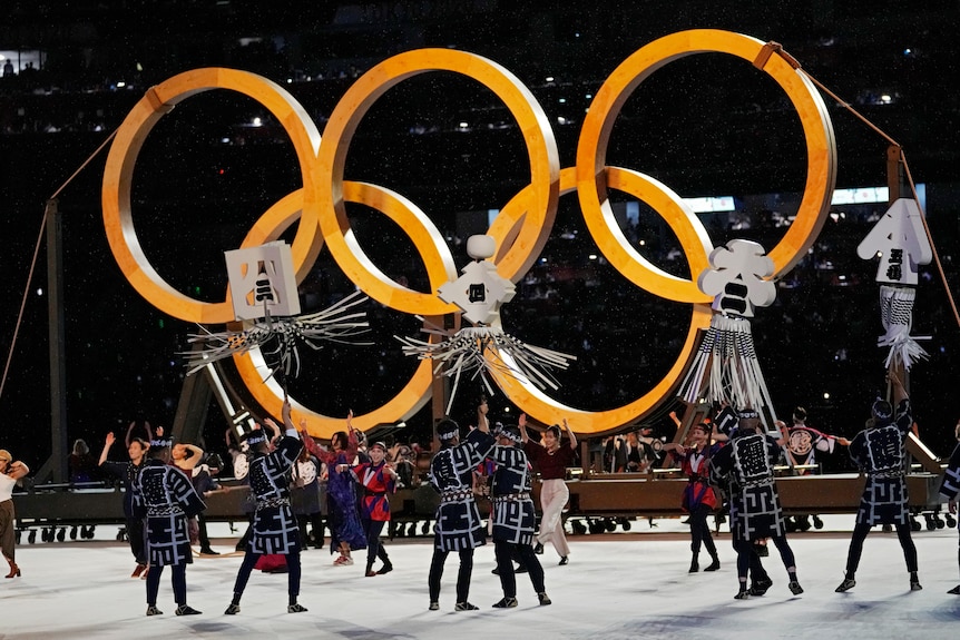Dancers perform during the opening ceremony in the Olympic Stadium 