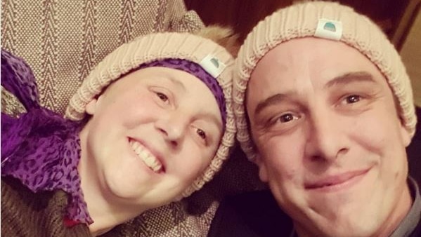 Connie Johnson and her brother Samuel with matching beanies