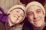 Connie Johnson and her brother Samuel with matching beanies