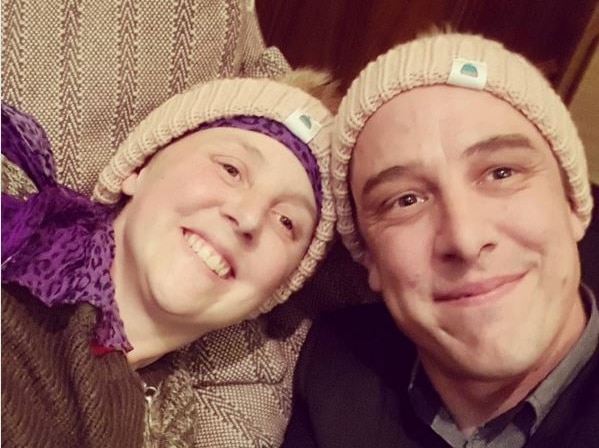 Connie Johnson and her brother Samuel with matching beanies