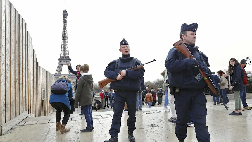 Police patrol near the Eiffel Tower