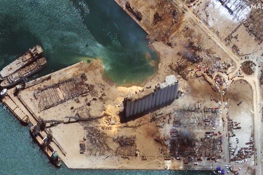 The Beirut grain silo before and after the explosion.