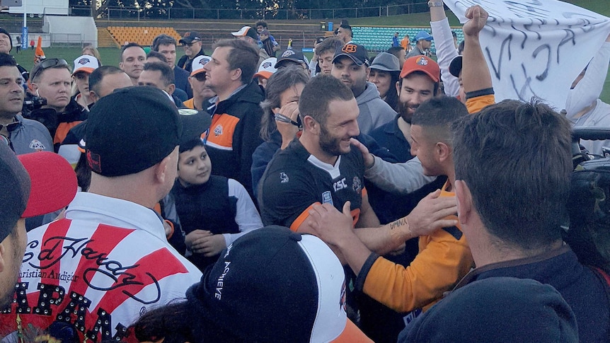 Robbie Farah swamped by fans after NSW Cup match