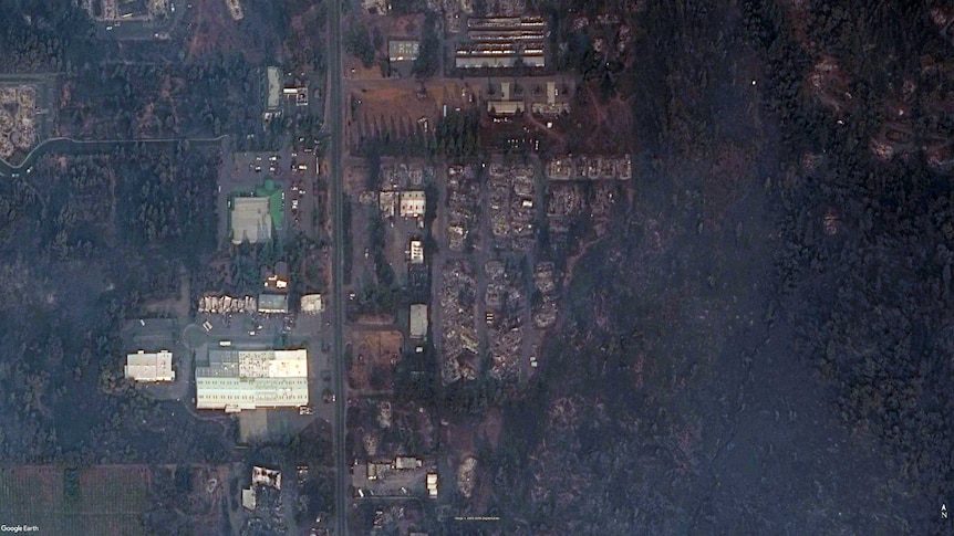 A satellite photo showing the burnt-out remains of the Pinecrest Mobile Home Park.