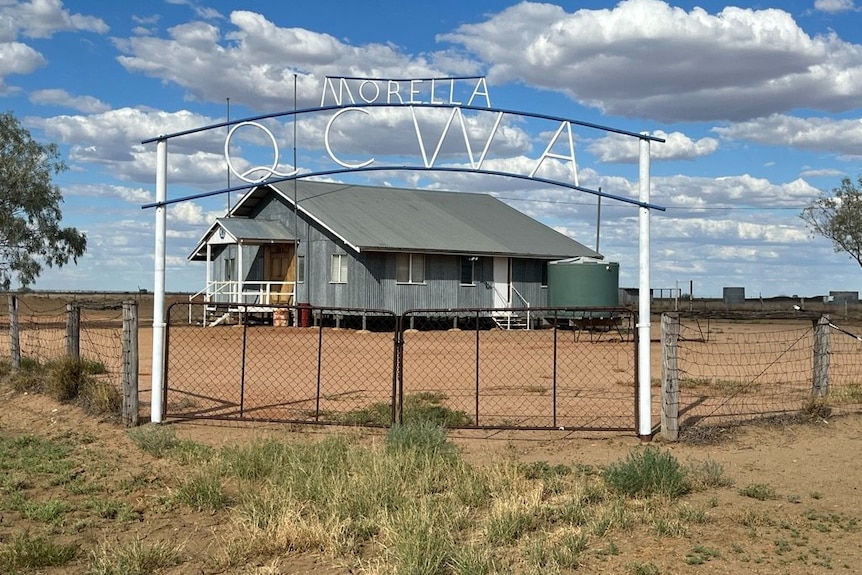 morella qcwa sign in front of old iron shed