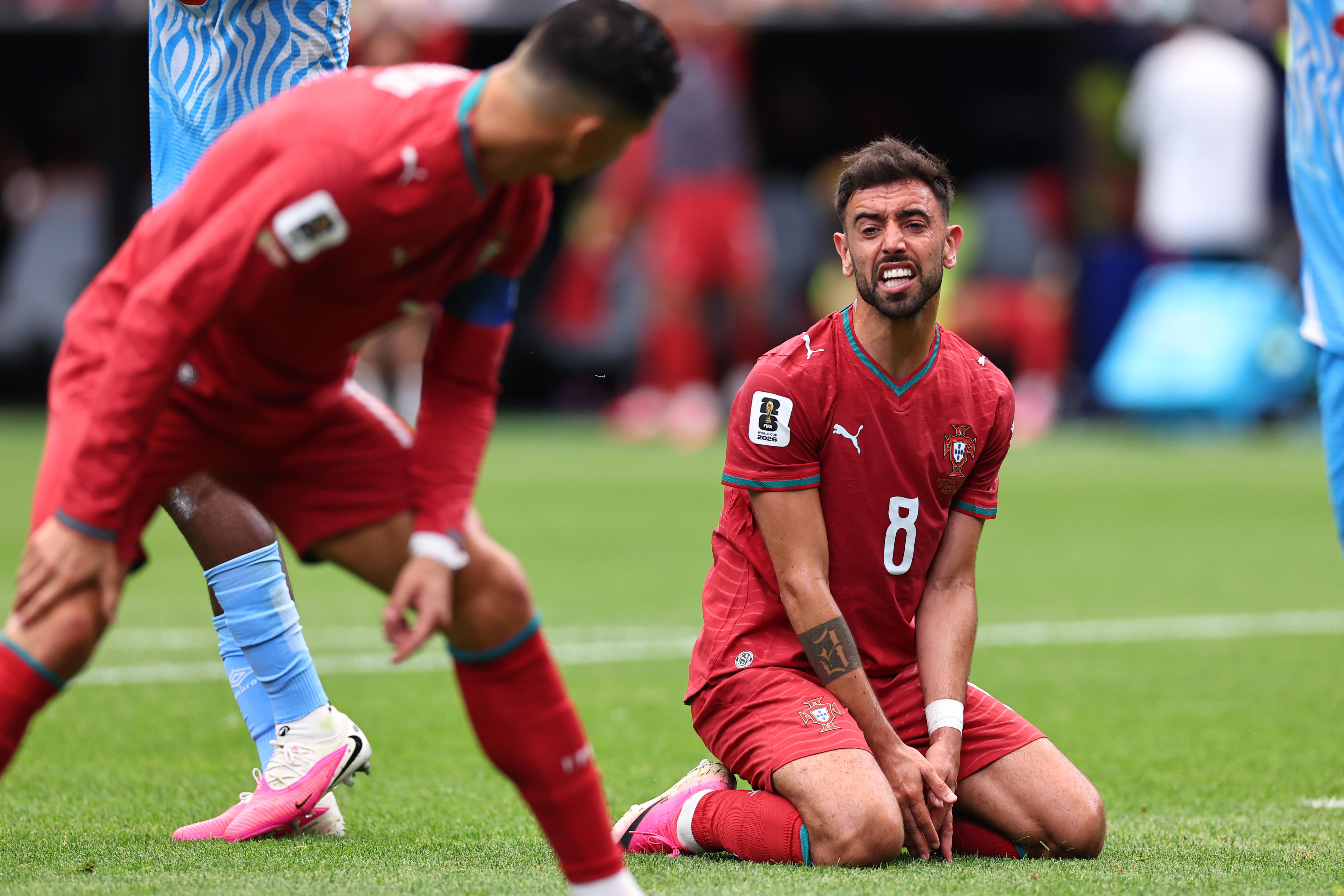 Bruno Fernandes looks at Cristiano Ronaldo