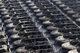 Rows of burnt out cars sit near the site of a series of explosions at a warehouse in the northern Chinese port city of Tianjin.