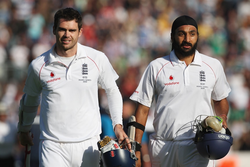 England batters James Anderson and Monty Panesar walk off the field after an Ashes Test against Australia at Cardiff in 2009.
