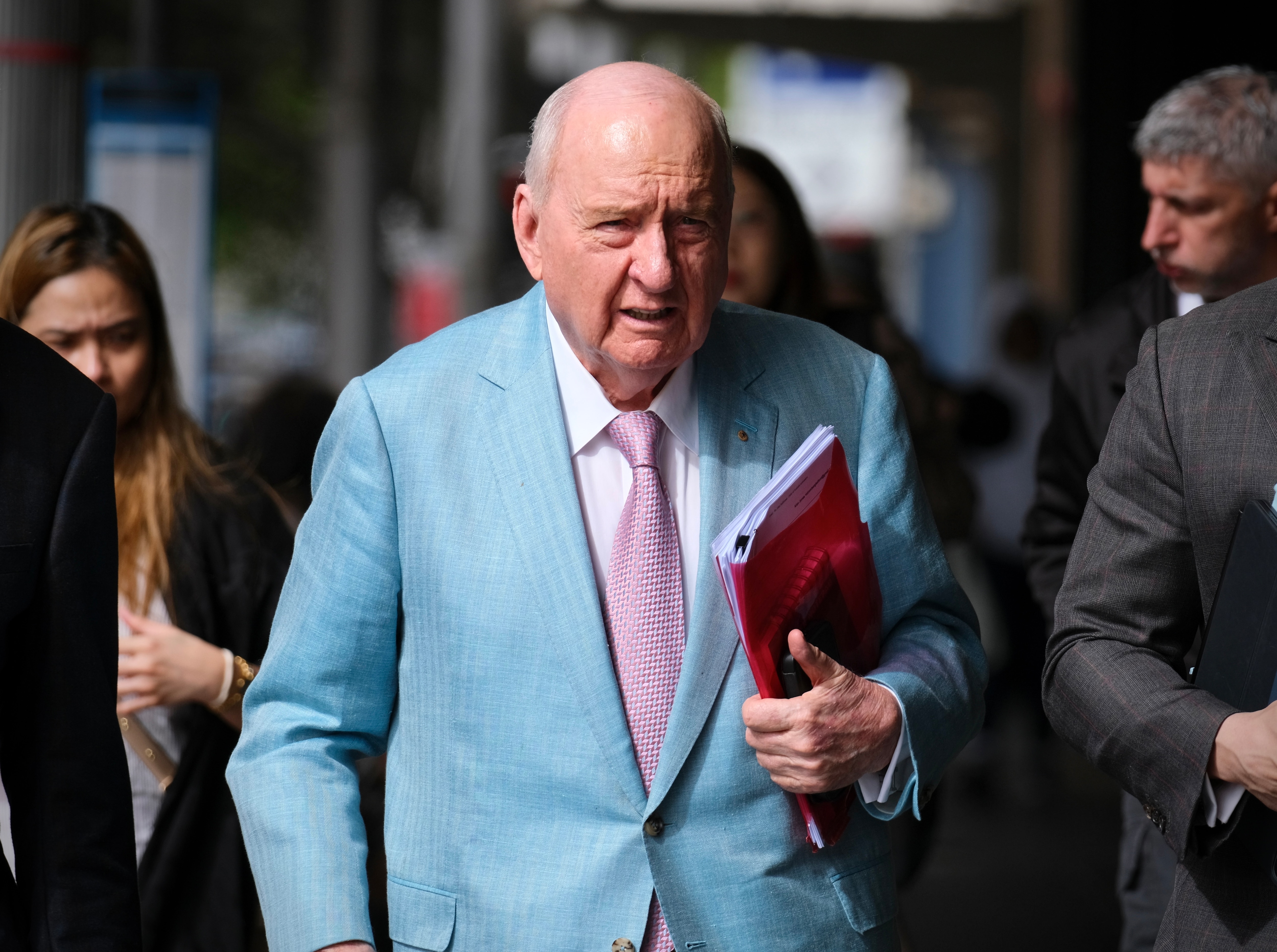 Athlete tells court he can't get alleged Alan Jones kiss 'out of my memory'