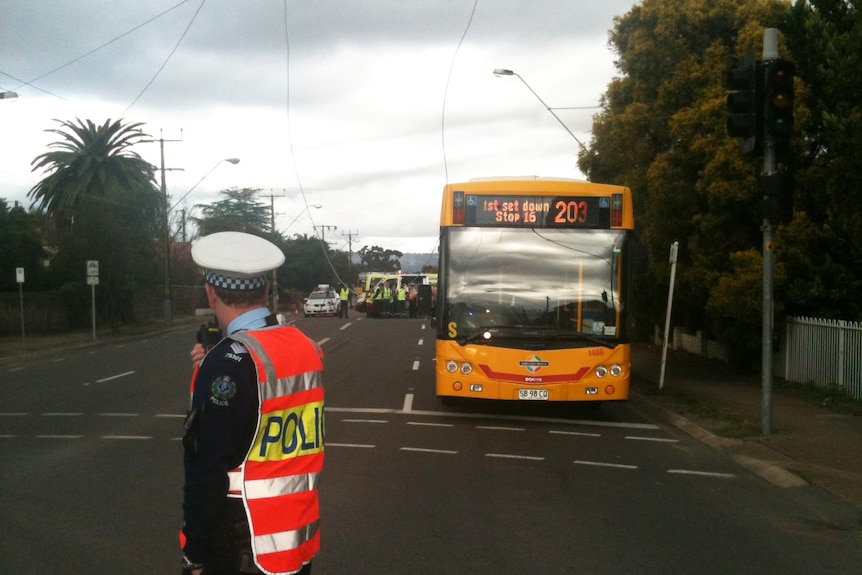 Police redirected traffic around the scene after powerlines fell onto an Adelaide bus