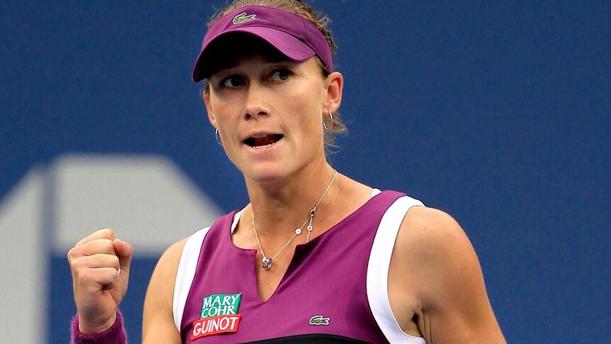 Samantha Stosur pumps the air after winning the first set during the final at the 2011 US Open