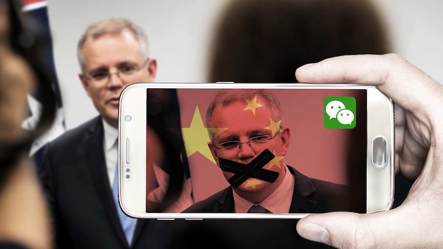 Scott Morrison viewed through a mobile phone coloured with the colours of the Chinese flag.