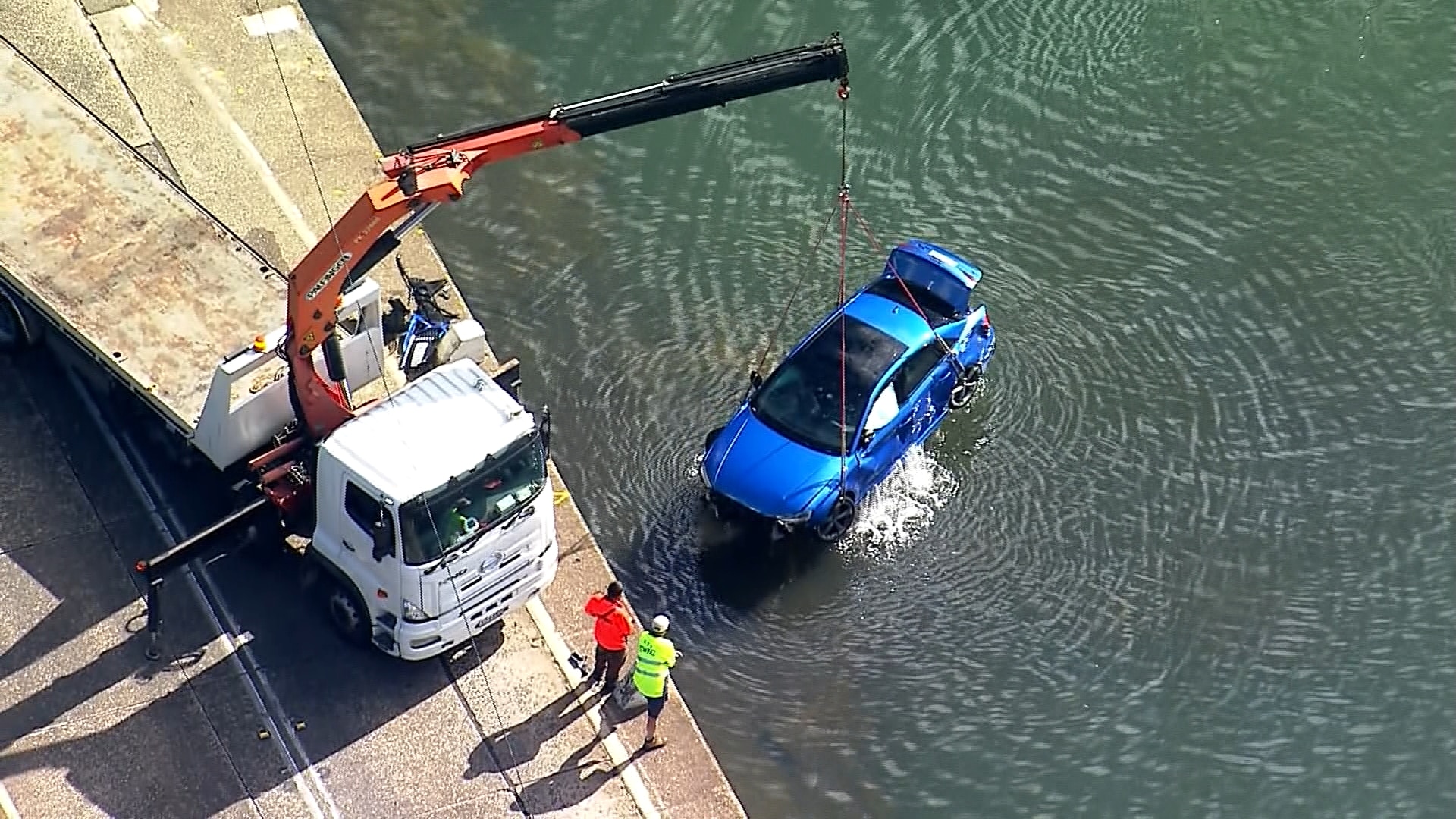 Divers search for man submerged in car at Sydney's Royal National Park
