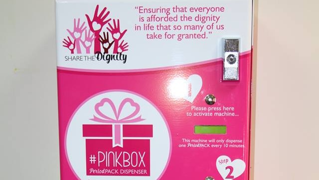 A Share the Dignity wall-mounted vending machine that dispenses sanitary products.
