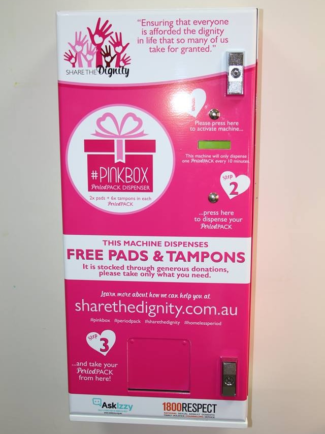 A Share the Dignity wall-mounted vending machine that dispenses sanitary products.