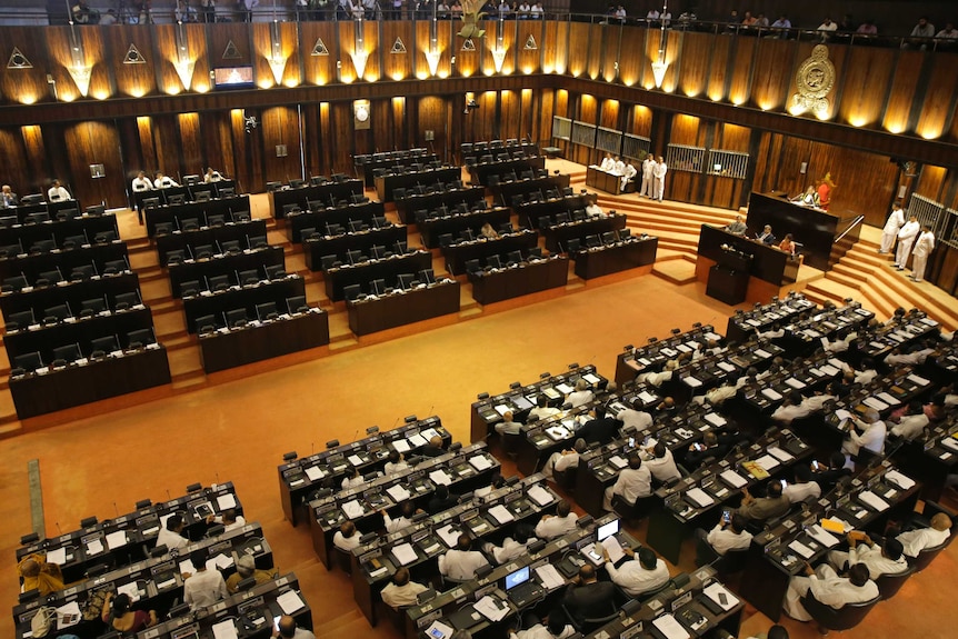 Empty seats of Sri Lanka's ruling party members are seen during a parliamentary session in Colombo, Sri Lanka