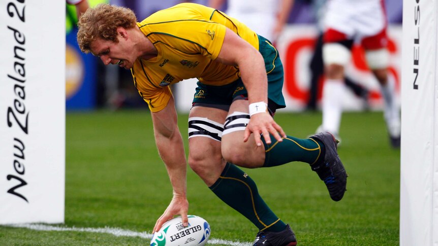 Australia Wallabies' David Pocock scores a try against Russia at the 2011 Rugby World Cup in Nelson.