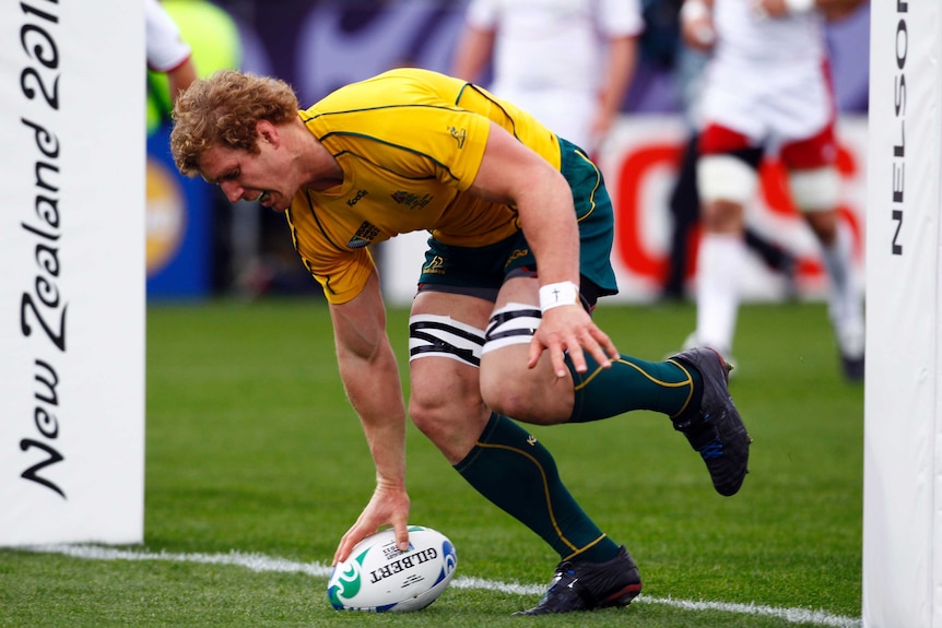 Australia Wallabies' David Pocock scores a try against Russia at the 2011 Rugby World Cup in Nelson.