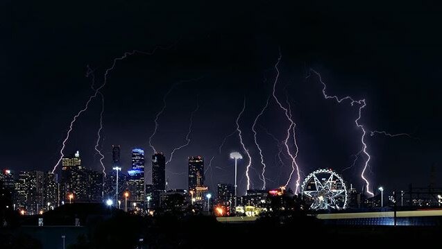 A night photograph of the Melbourne skyline during a storm