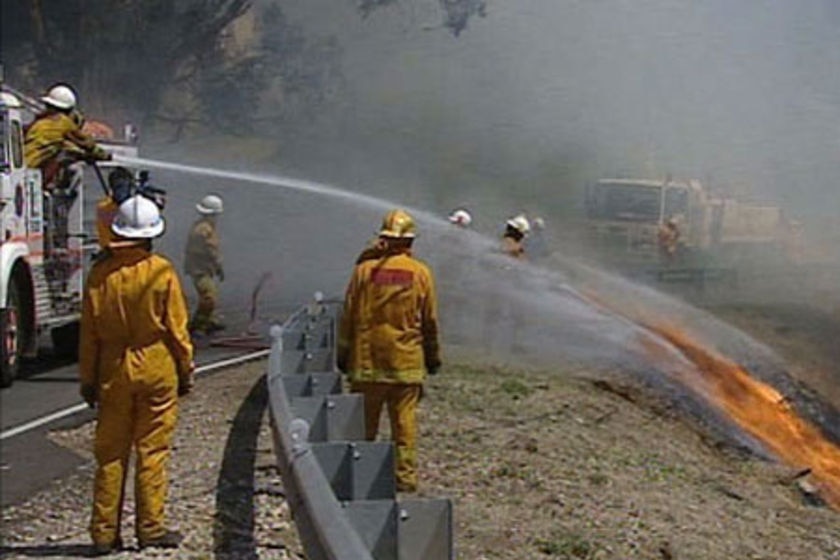 Firefighters by a roadside in the Adelaide hills