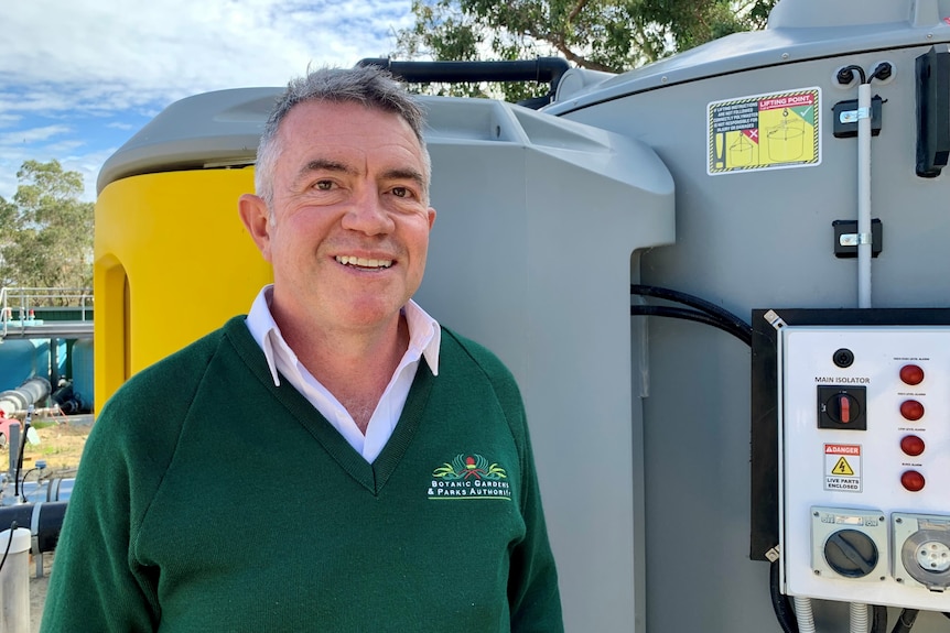 Patrick Courtney standing alongside Kings Park's water treatment equipment.