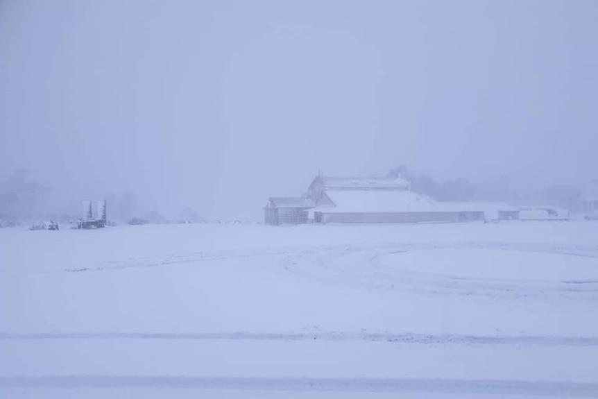 Snow falling at Great Lake Hotel, in Tasmania's Central Highlands.