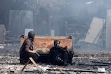 Photographers take cover in Cairo