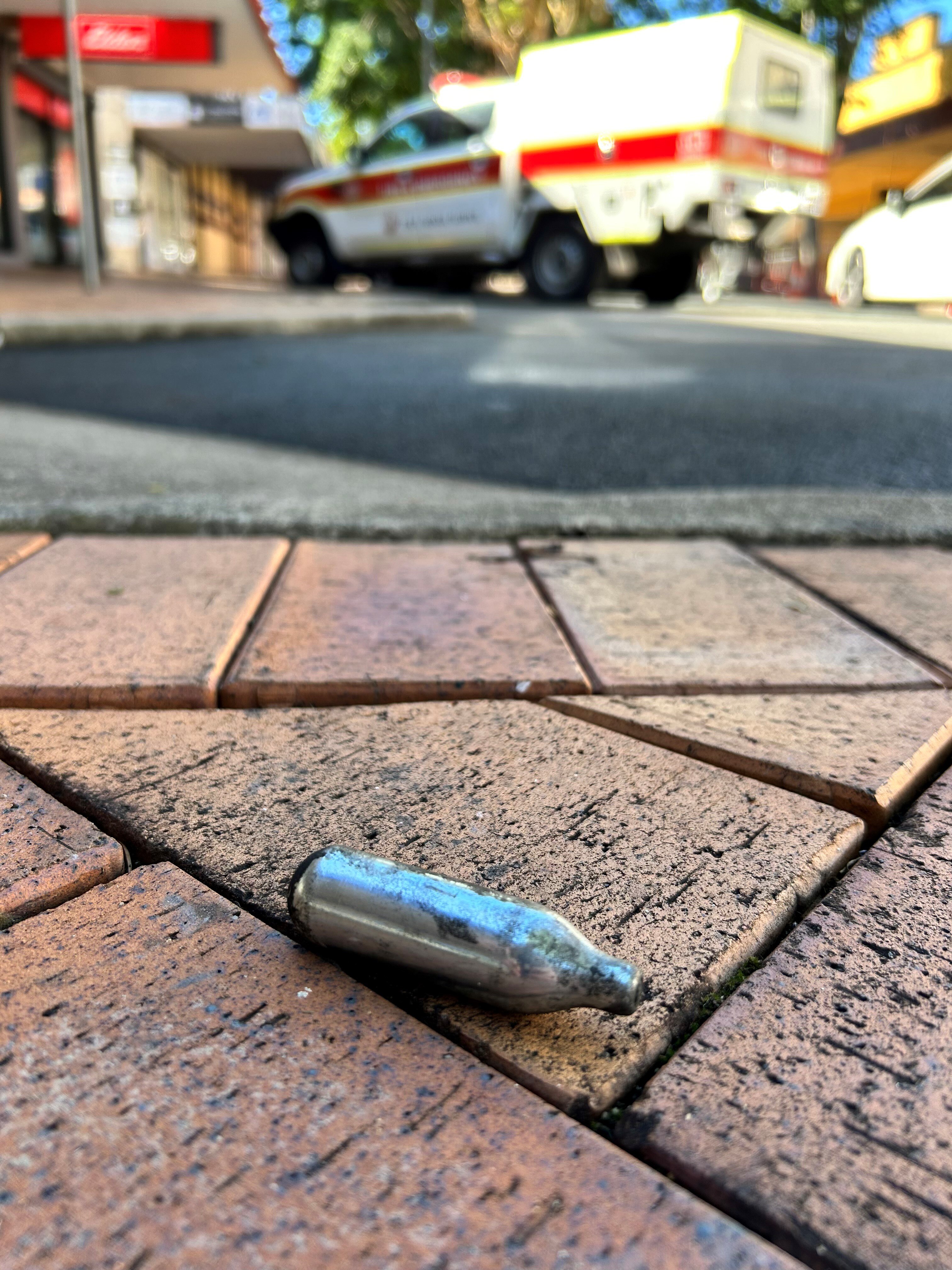 Explosions wake town as suspicious fire rips through shopfronts on