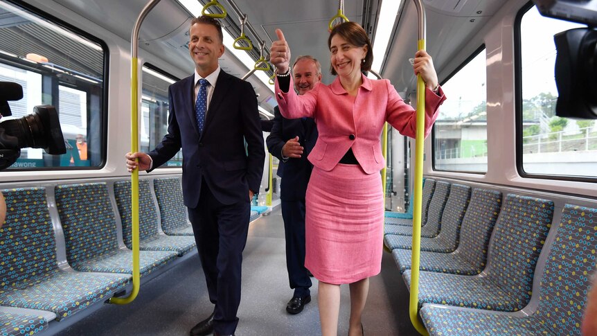 The Premier showing off the new trains with Transport Minister Andrew Constance