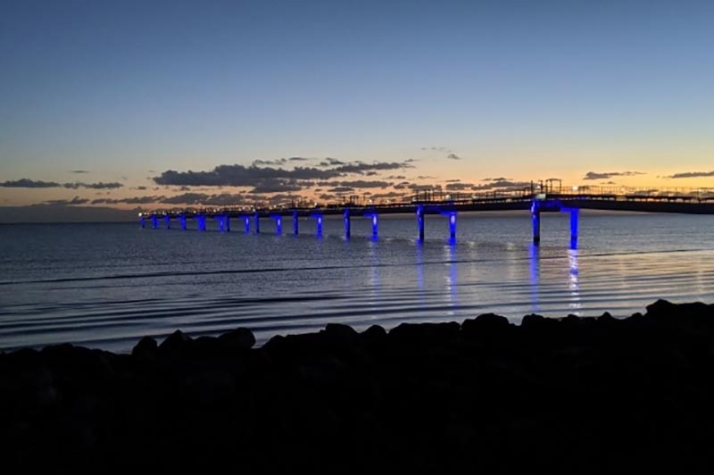 A line of high intensity blue light in the water for Brisbane's new second runway.