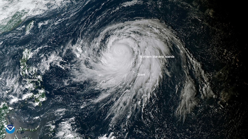 Satellite image shows Typhoon Hagibis swirling above the ocean.